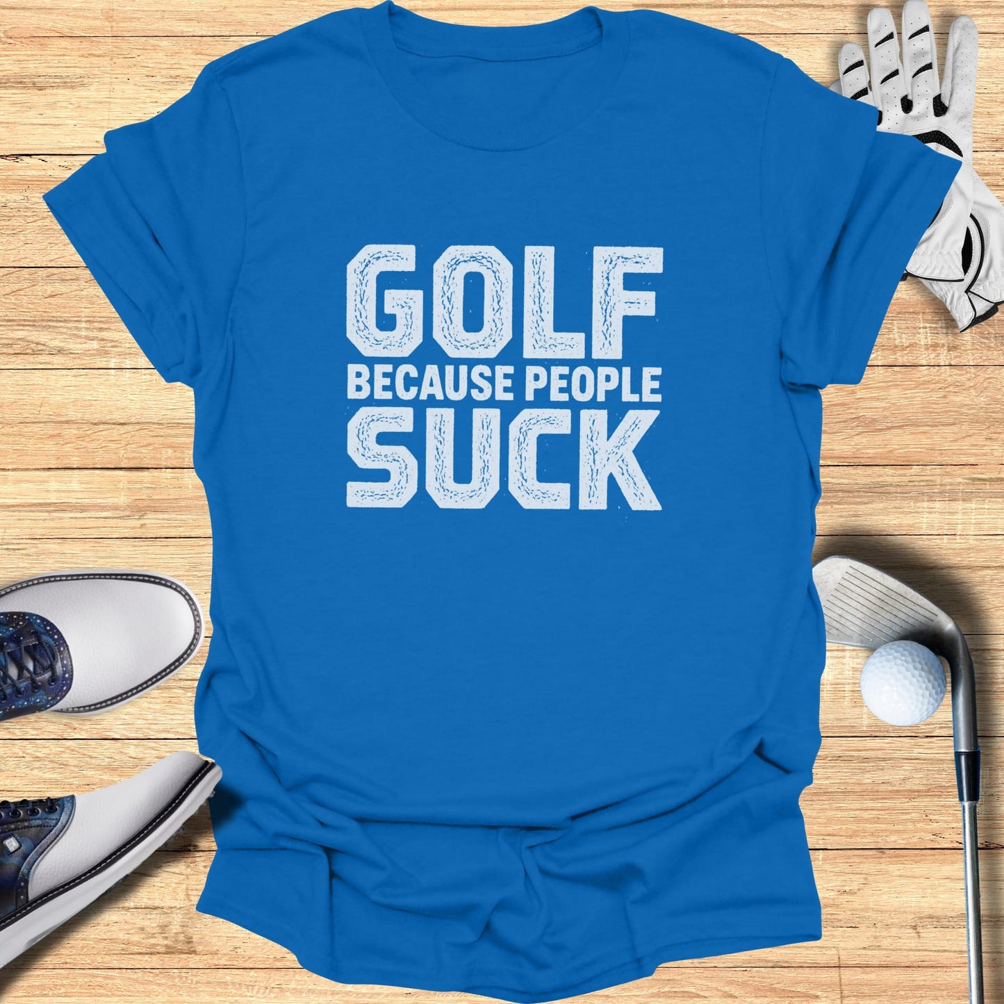 Blue t-shirt with "GOLF BECAUSE PEOPLE SUCK" text.