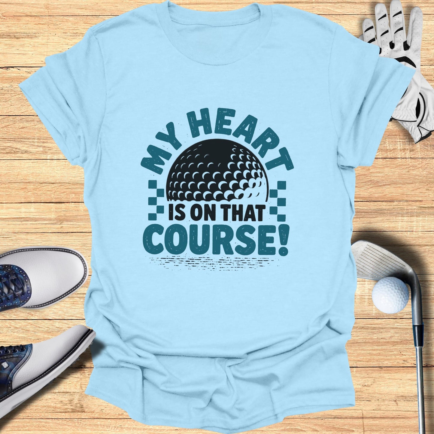 Light blue t-shirt with "My Heart Is On That Course!" text and golf ball graphic.