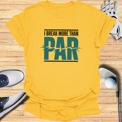 Yellow t-shirt with text "I BREAK MORE THAN PAR" and golf accessories.
