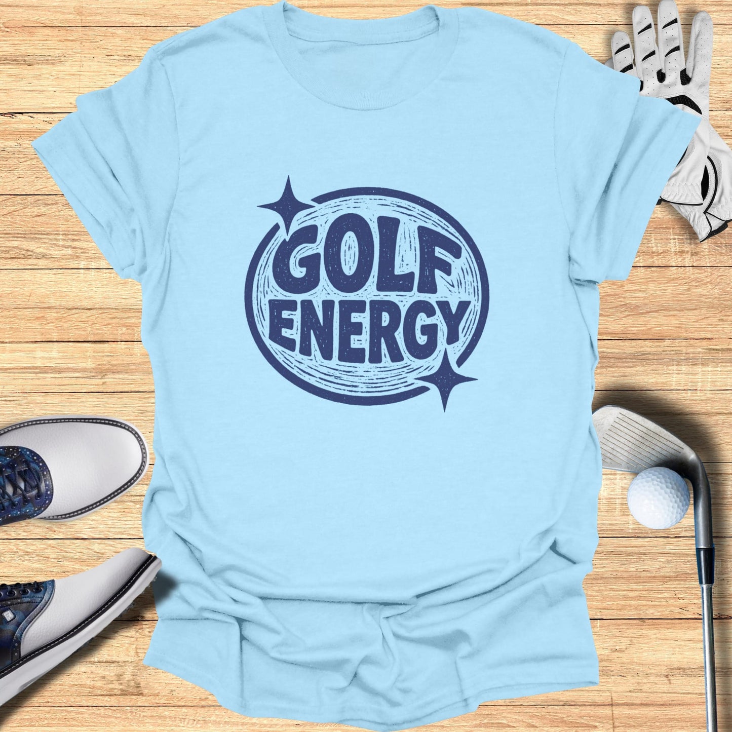 Light blue t-shirt with "GOLF ENERGY" text inside a blue circle with stars.