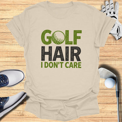 T-shirt with "GOLF HAIR I DON'T CARE" text and golf accessories.