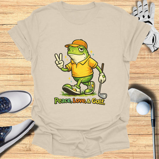 Cartoon frog in golf attire gives a peace sign, with "Peace, Love, & Golf" text.