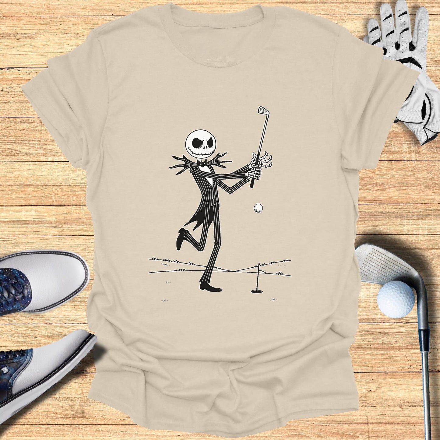 Jack Skellington playing golf, wearing a t-shirt.