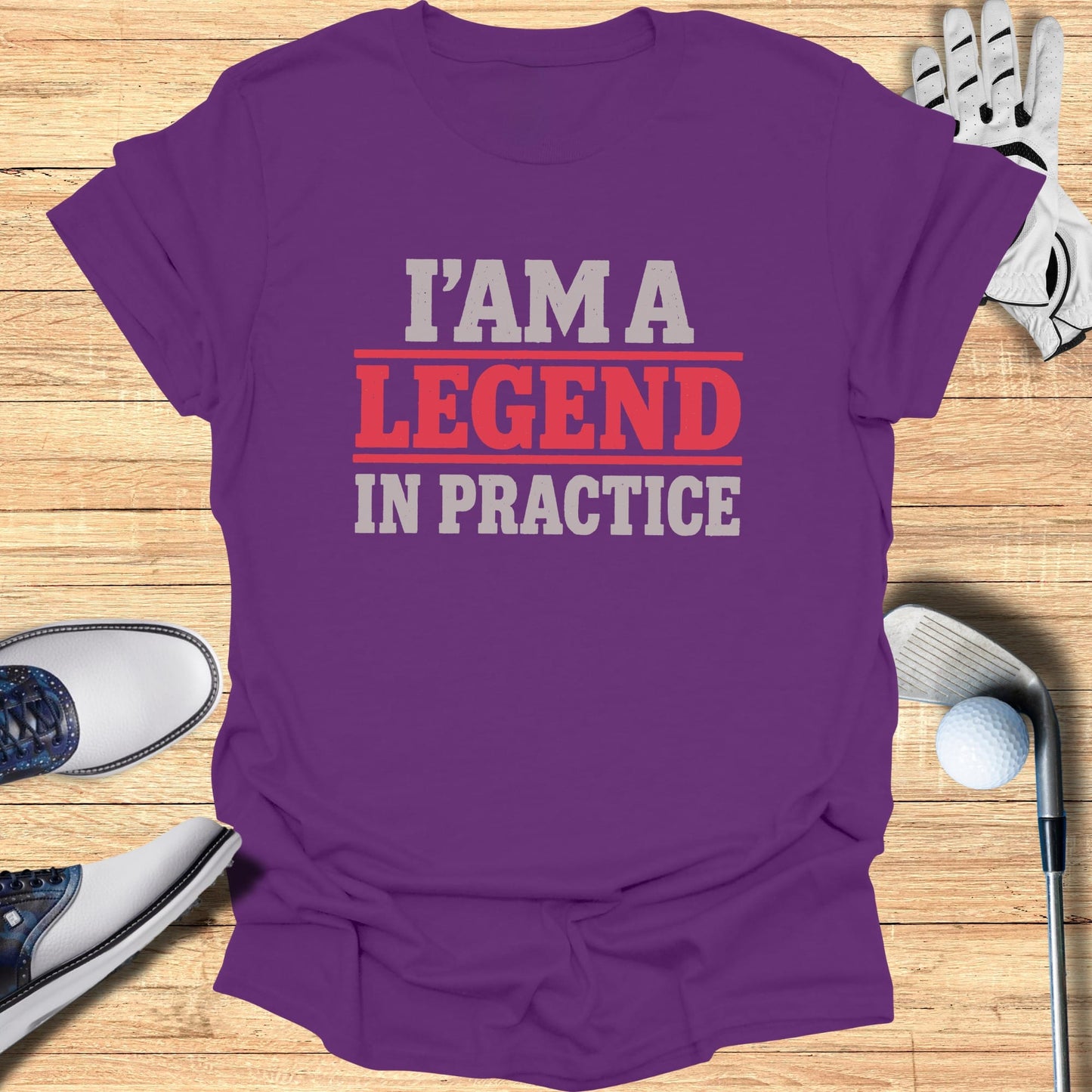 Purple t-shirt with "I'M A LEGEND IN PRACTICE" in red and gray text.