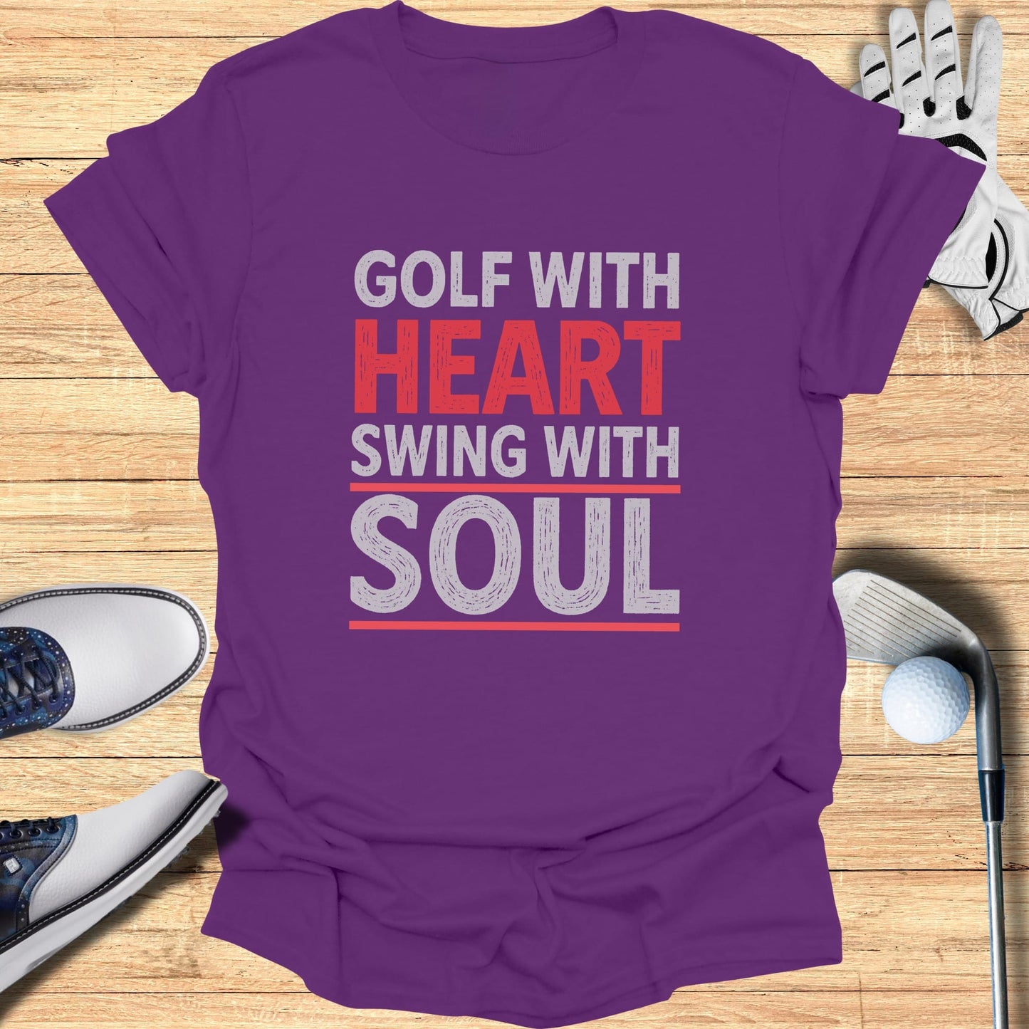 Purple t-shirt with "GOLF WITH HEART SWING WITH SOUL" text.