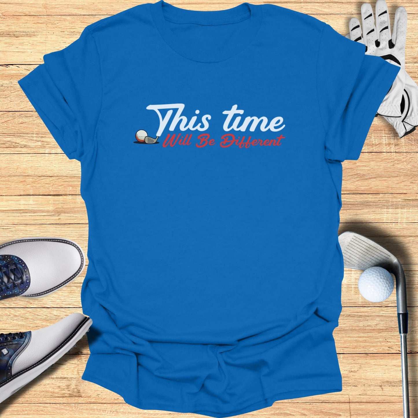 Blue t-shirt with "This Time Will Be Different" text, golf clubs, and shoes.