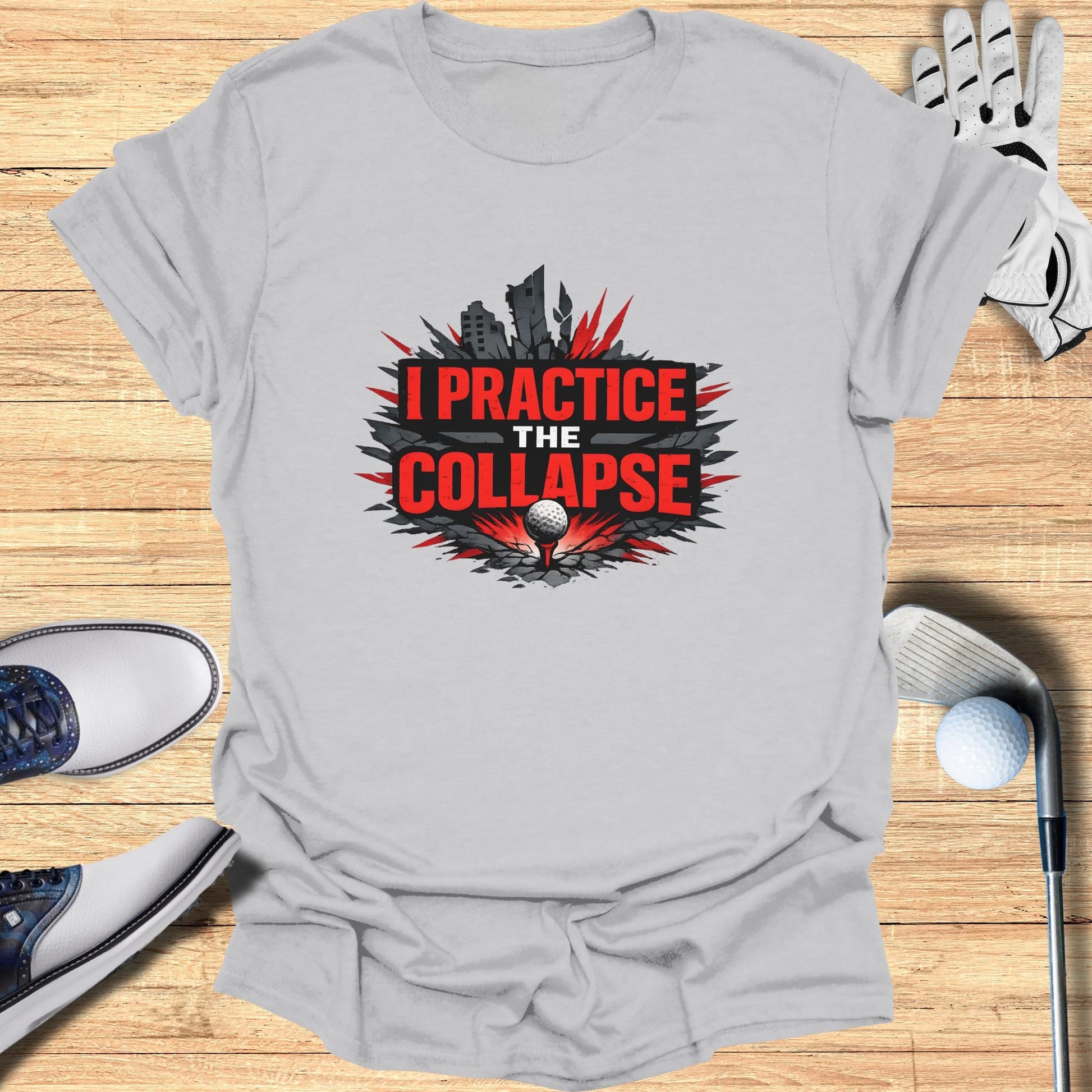 Gray t-shirt with "I PRACTICE THE COLLAPSE" text and a golf ball.