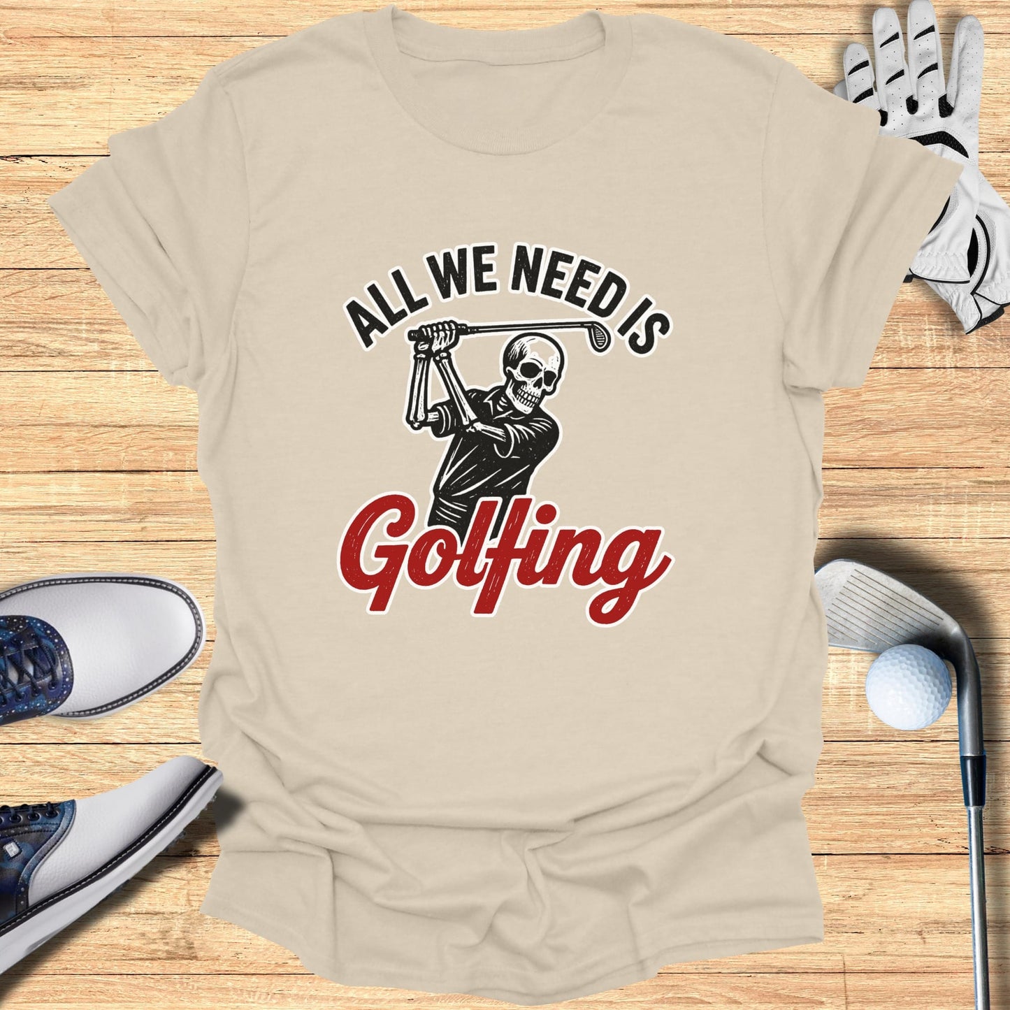 Skeleton golfer in mid-swing with "All We Need Is Golfing" text.