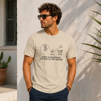 Man wearing a tan t-shirt with physics and tempo graphic.