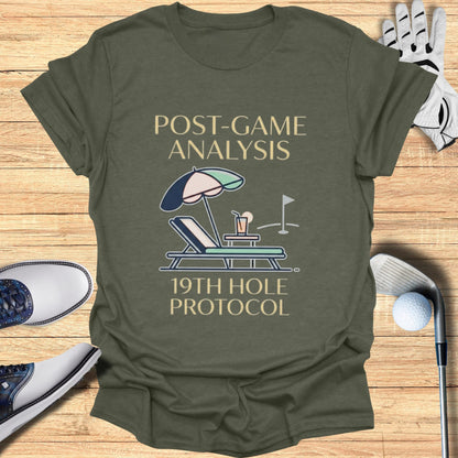 T-shirt with "Post-Game Analysis 19th Hole Protocol" text and golf graphics.