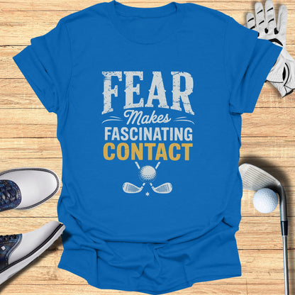 Blue t-shirt with "FEAR MAKES CONTACT" and golf graphics.