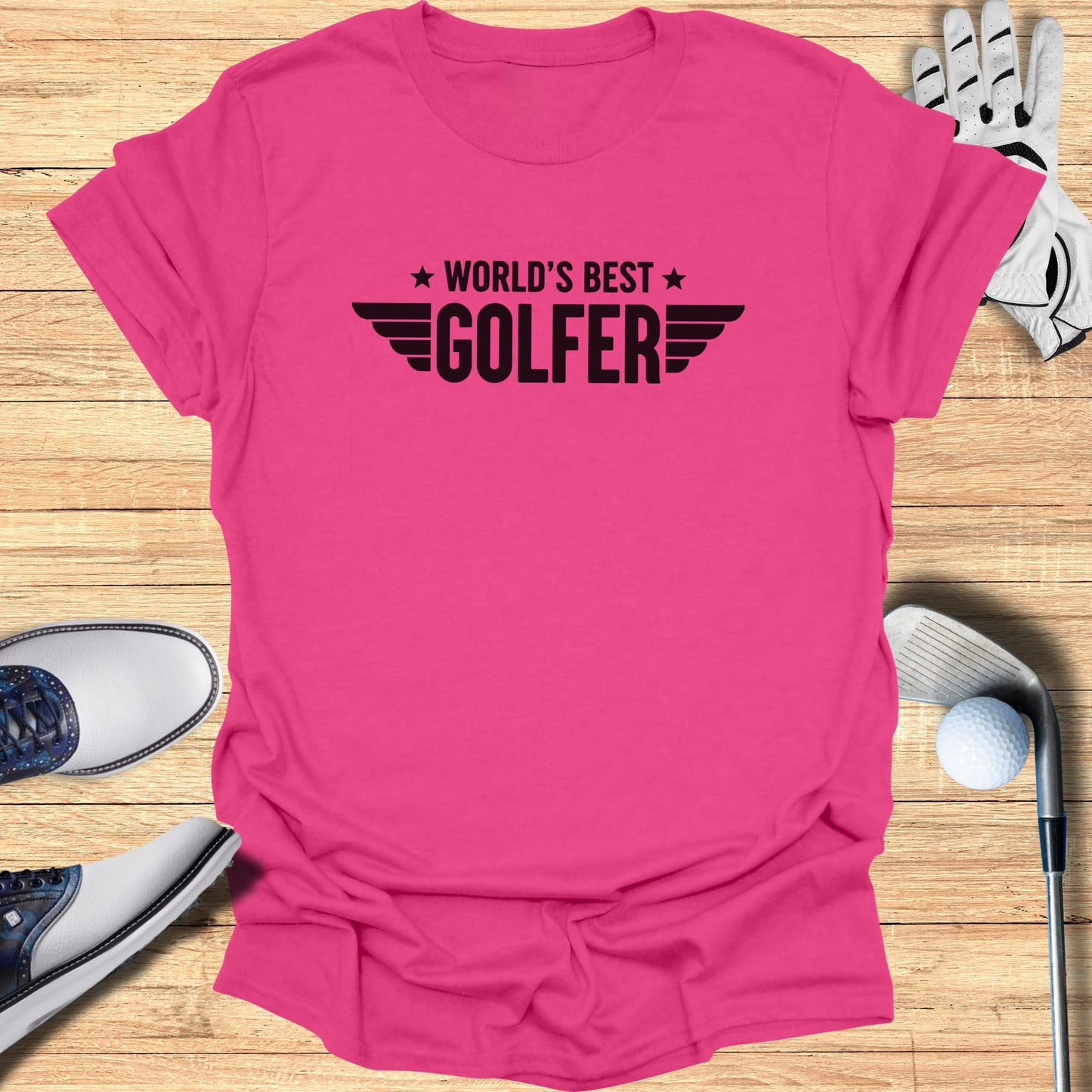 Pink t-shirt with "World's Best Golfer" text and golf accessories.