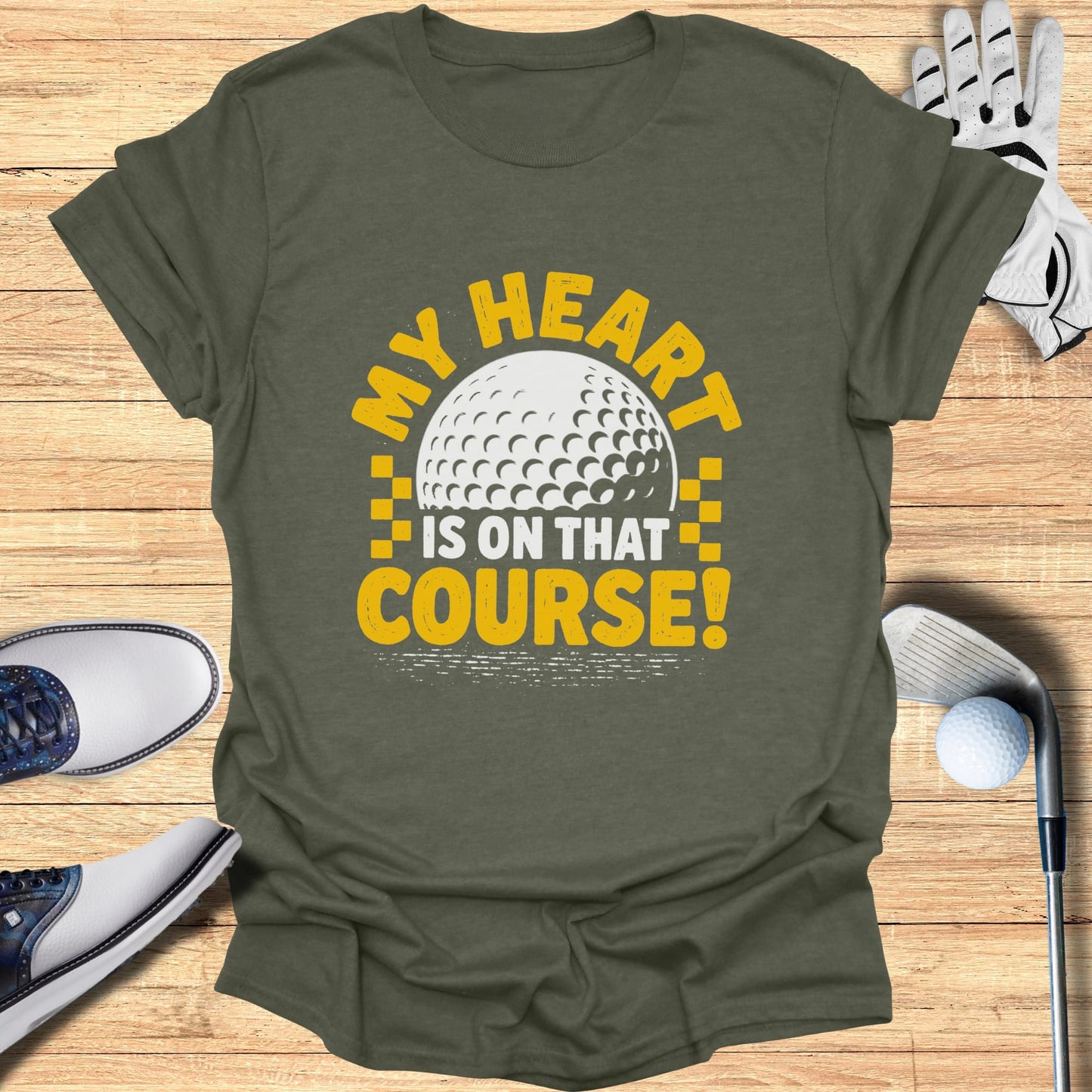 Green t-shirt with "My heart is on that course!" text and golf ball graphic.