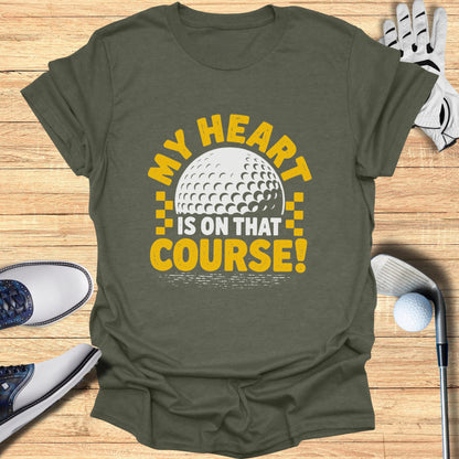 Green t-shirt with "My heart is on that course!" text and golf ball graphic.