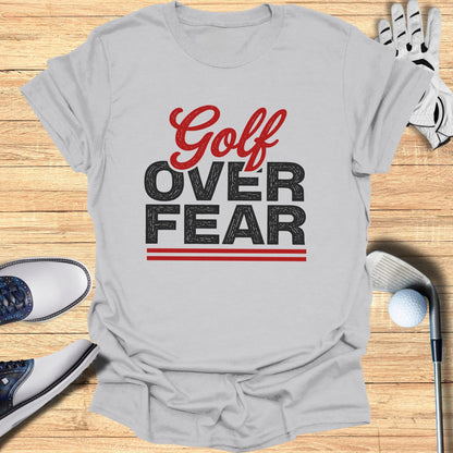 Grey t-shirt with "Golf Over Fear" text in red and black.