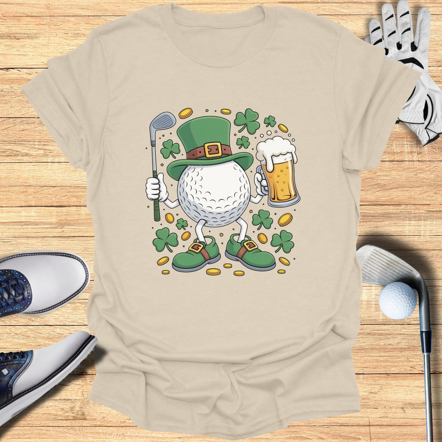 Golf ball character in St. Patrick's Day attire holding a golf club and beer.