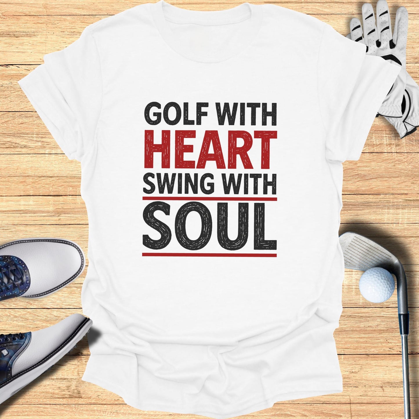 White t-shirt with "GOLF WITH HEART SWING WITH SOUL" text.
