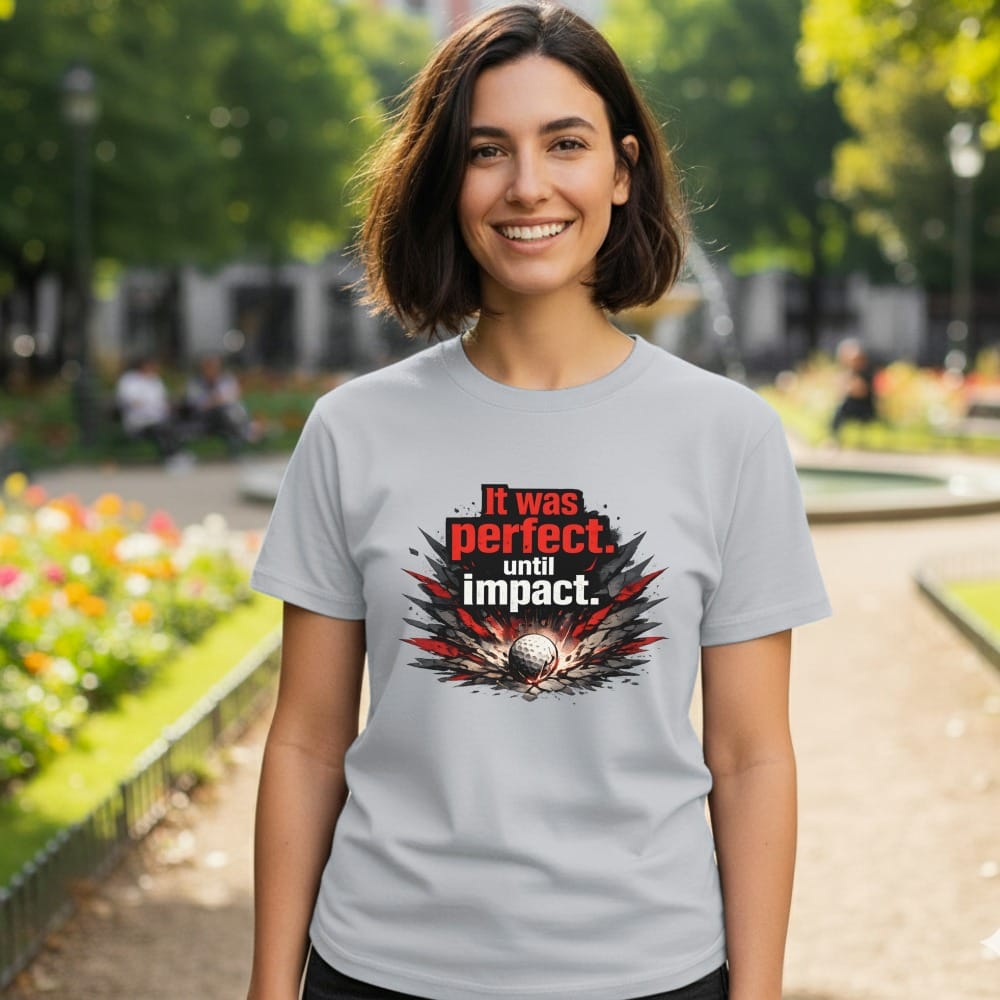 Grey t-shirt with "It was perfect. until impact." and a golf ball graphic.