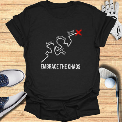 Black t-shirt with abstract line art and text "EMBRACE THE CHAOS".