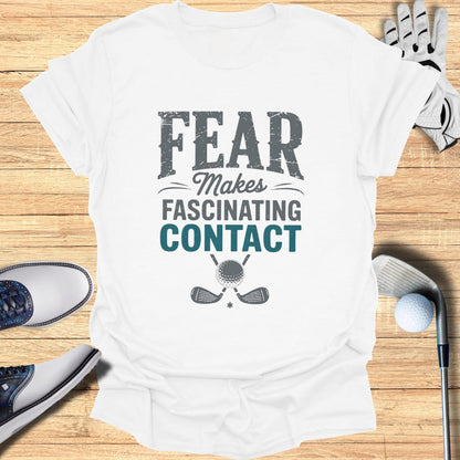 T-shirt with "FEAR MAKES FASCINATING CONTACT" golf graphic.