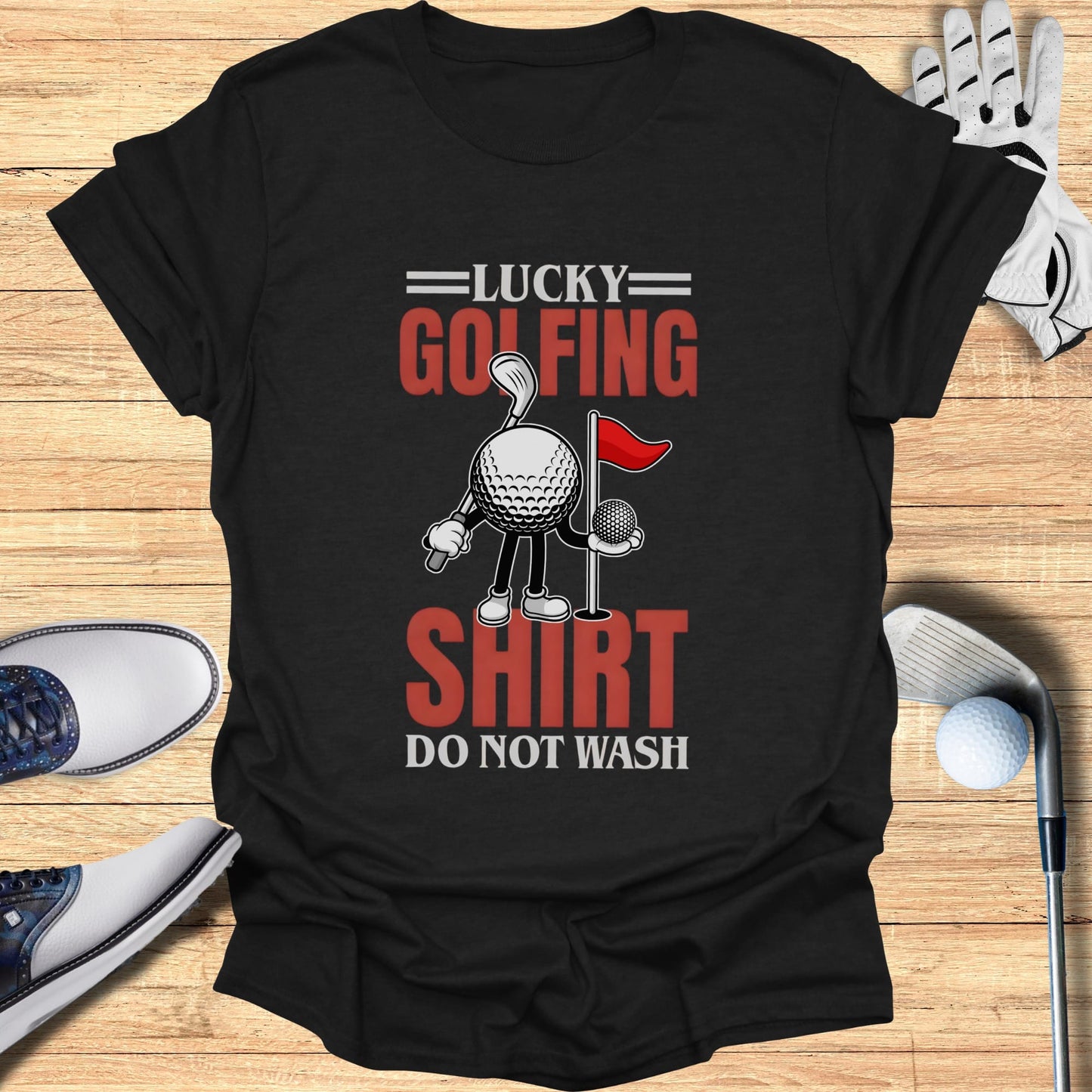 Black t-shirt with "Lucky Golfing Shirt Do Not Wash" text and golf ball graphic.