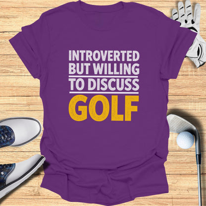 Purple t-shirt with "Introverted but willing to discuss golf" text in white and yellow.