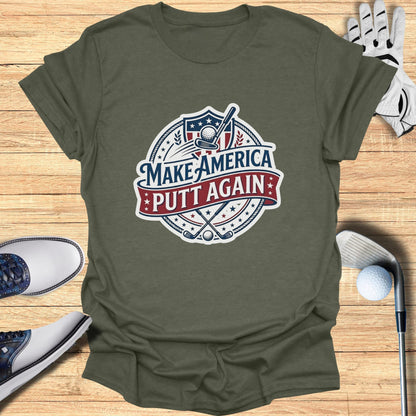 Green t-shirt with "Make America Putt Again" slogan and golf imagery.