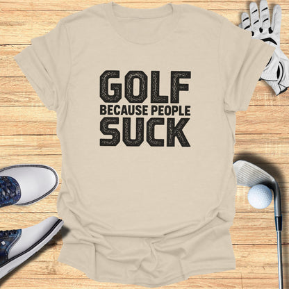 Beige t-shirt with black text "GOLF BECAUSE PEOPLE SUCK".