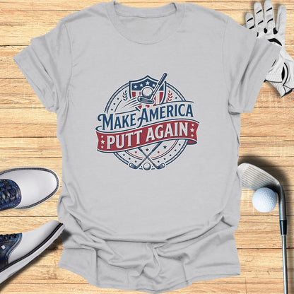 Gray t-shirt with "Make America Putt Again" golf logo.