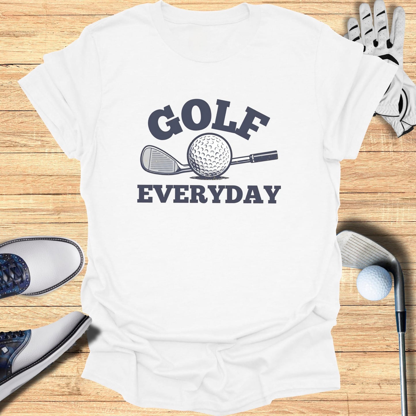 White t-shirt with "GOLF EVERYDAY" text and golf club graphic.