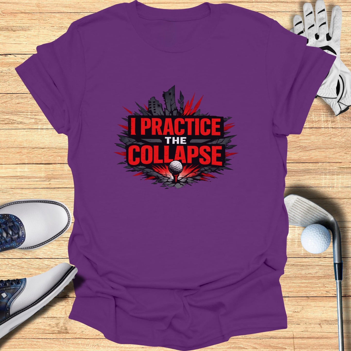 Purple t-shirt with "I PRACTICE THE COLLAPSE" graphic and golf ball.