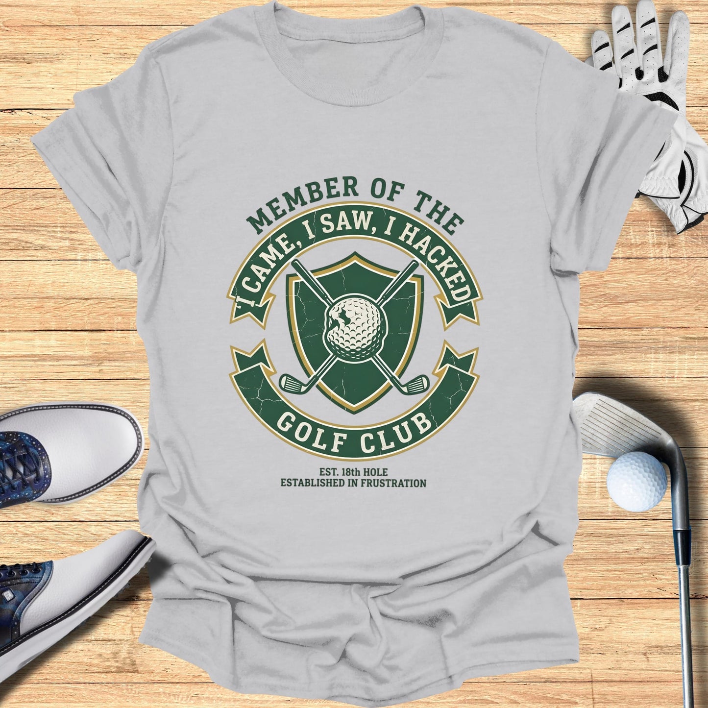 Gray t-shirt with "Member of the Golf Club" crest and "Established in Frustration" text.