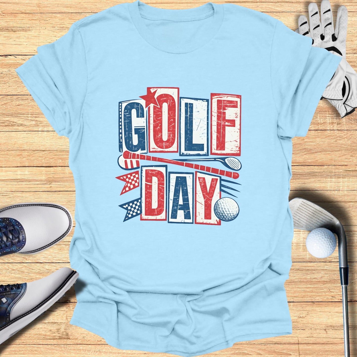 Light blue t-shirt with "Golf Day" in red, white, and blue lettering.