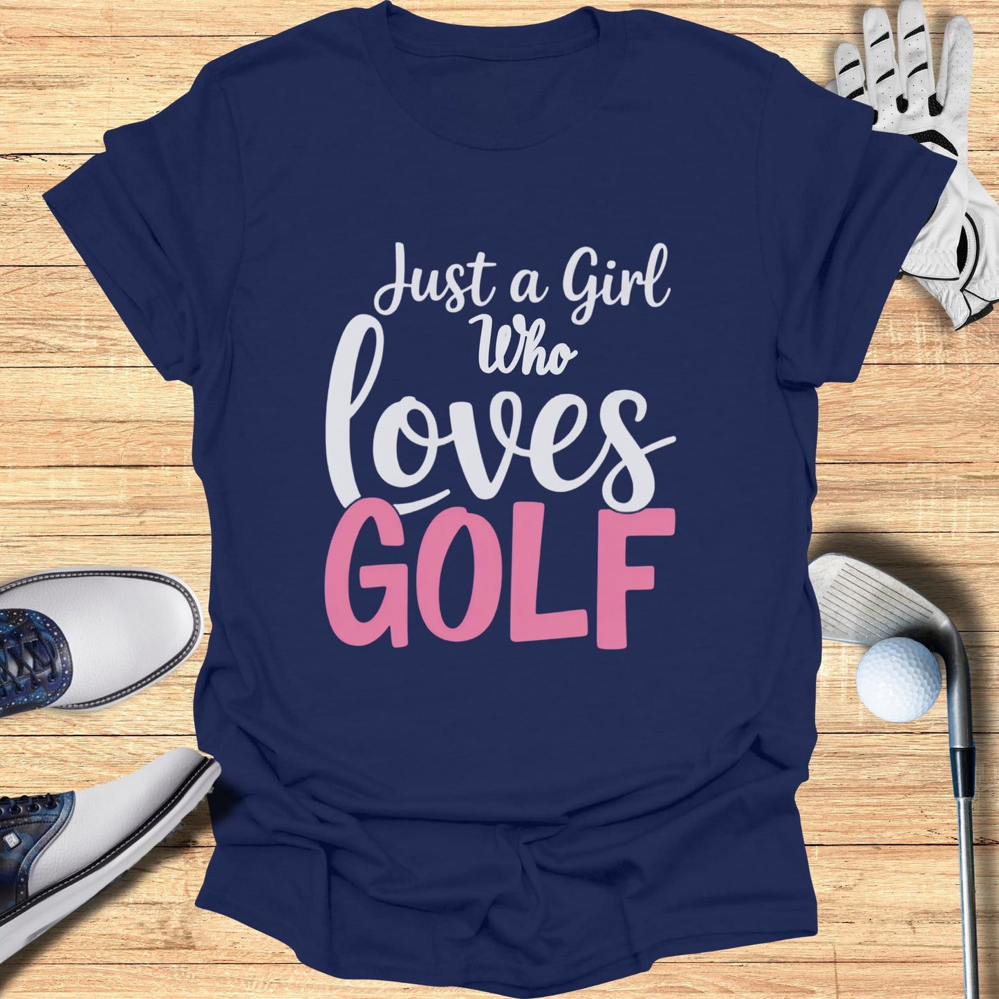 Navy t-shirt with "Just a Girl Who Loves GOLF" in white and pink text.