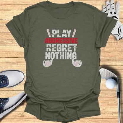 Green t-shirt with "PLAY AGGRESSIVE REGRET NOTHING" text and golf items.