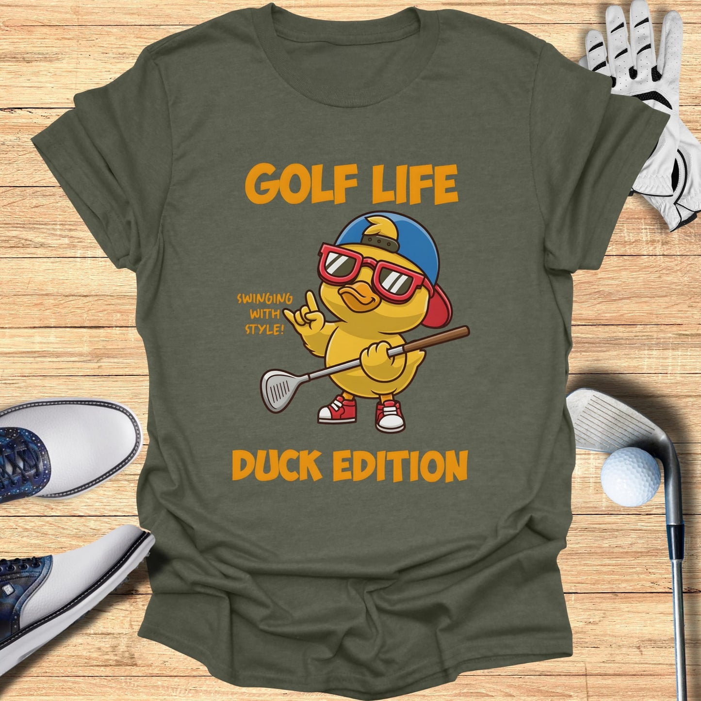 T-shirt with cartoon duck wearing sunglasses and holding golf club, "GOLF LIFE DUCK EDITION" text.