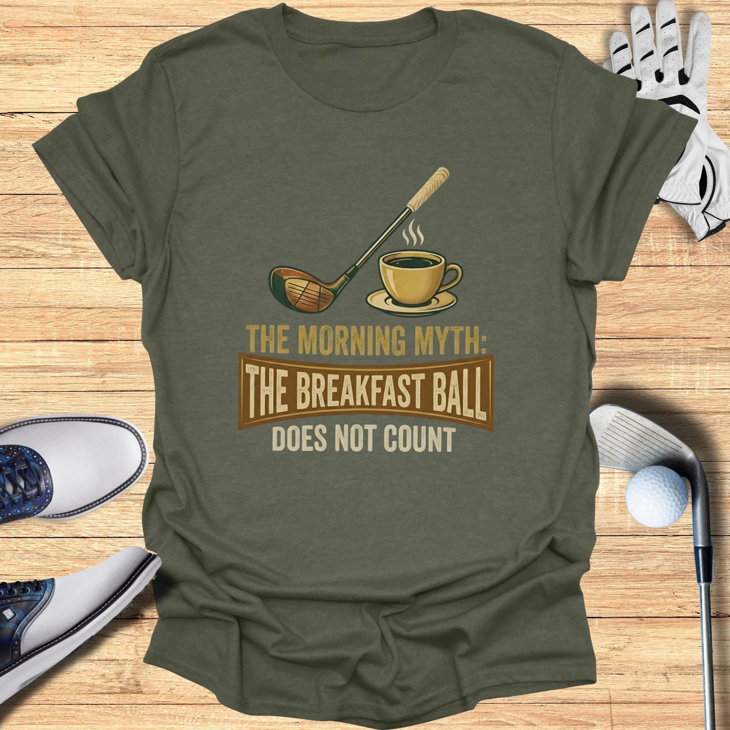 T-shirt with golf club, coffee cup, and text: The Morning Myth: Does Not Count.
