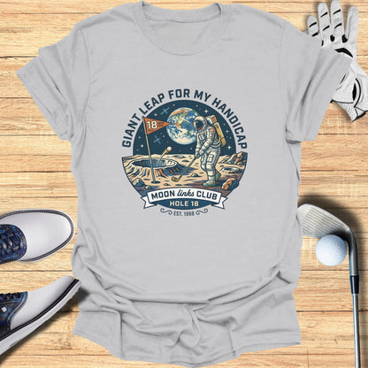 Astronaut plays golf on moon, "Giant Leap For My Handicap" text.