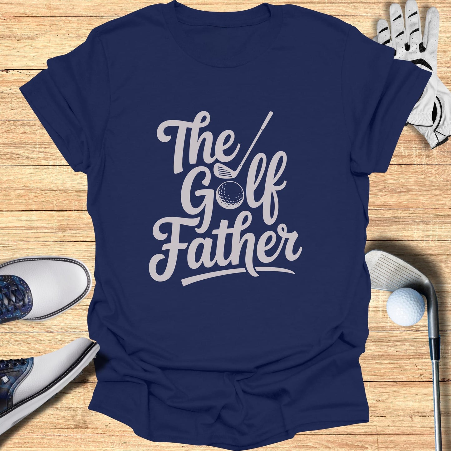 Navy t-shirt with "The Golf Father" text and golf equipment.