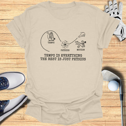T-shirt with golf accessories, featuring "TEMPO IS EVERYTHING THE REST IS JUST PHYSICS" text.
