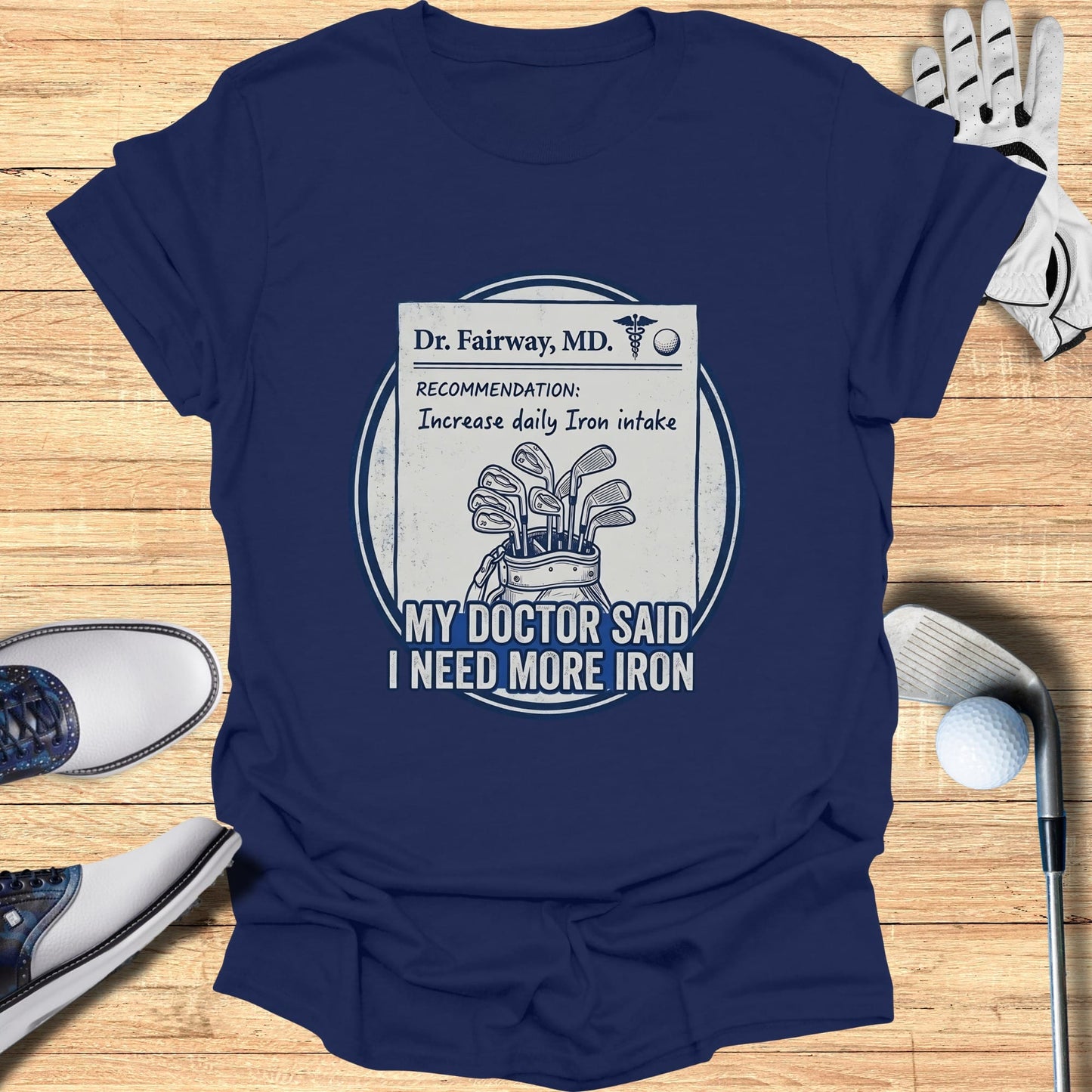 Navy t-shirt with "Dr. Fairway, MD." recommending more iron intake.