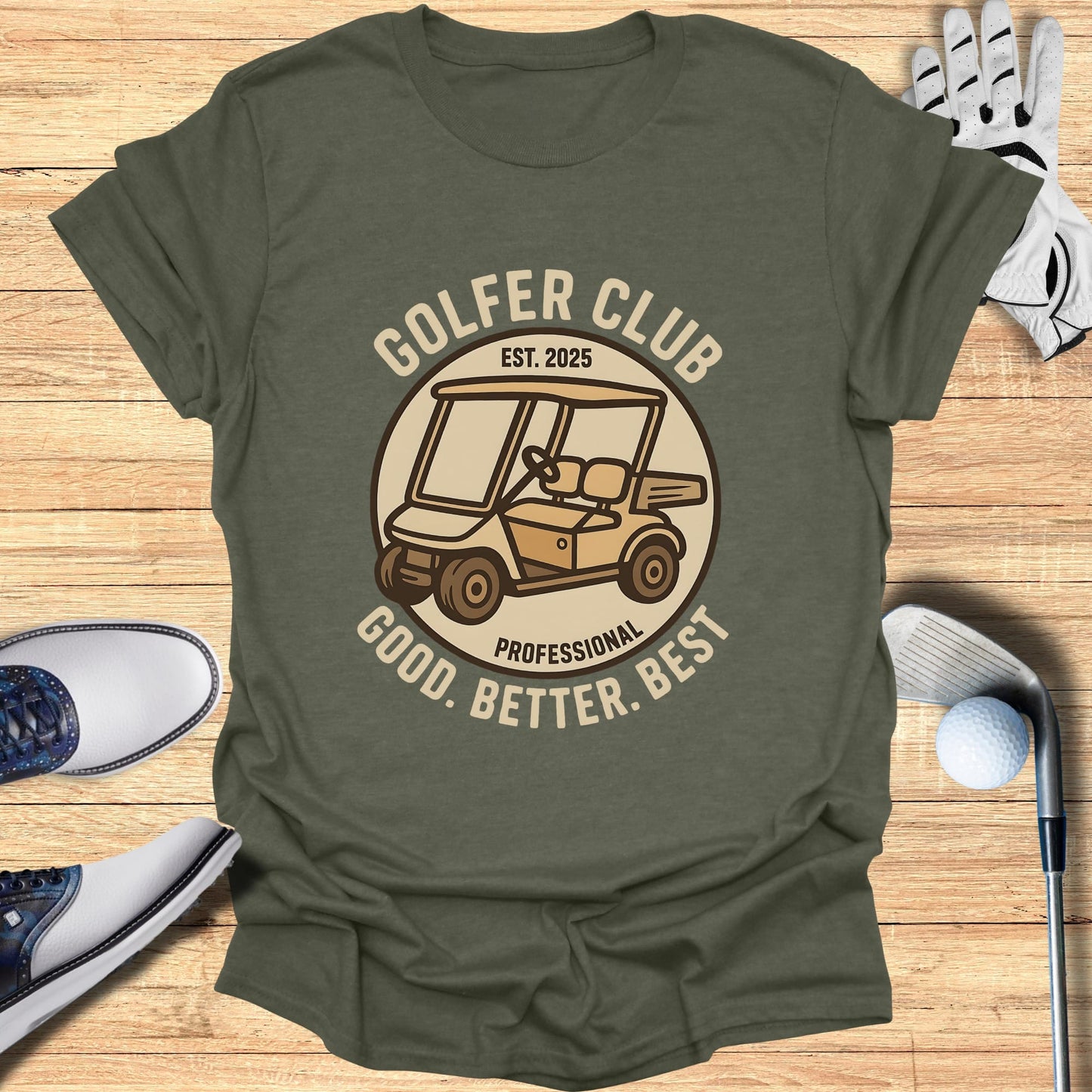Olive t-shirt with "Golfer Club" logo featuring a golf cart, text "EST. 2025 GOOD. BETTER. BEST."