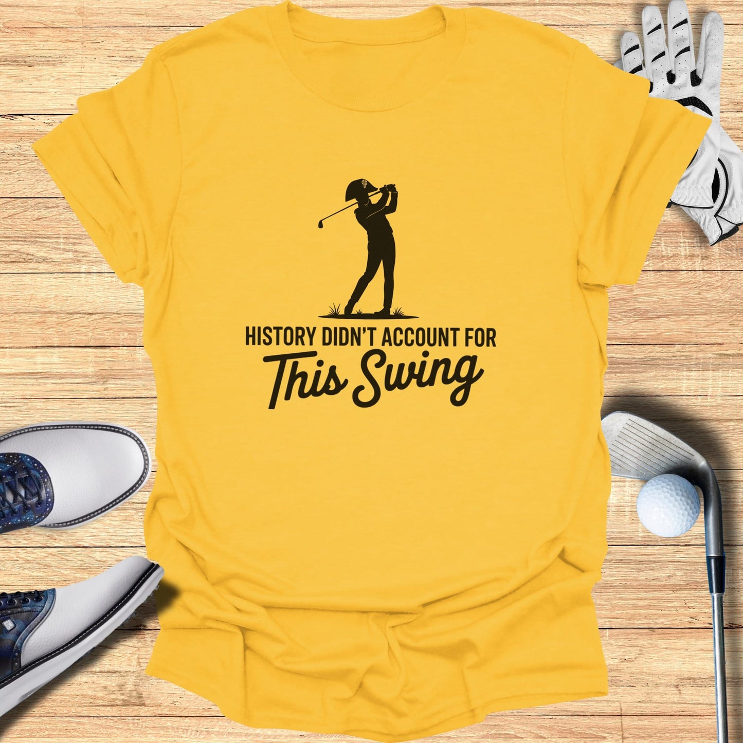 Yellow t-shirt with "History didn't account for This Swing" graphic.