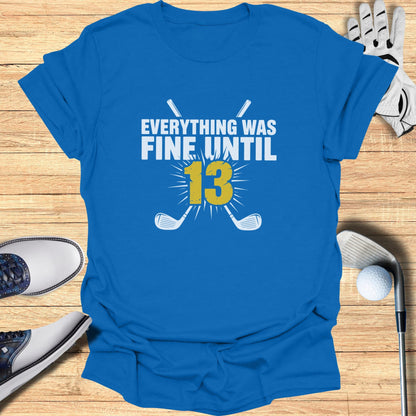 Blue t-shirt with "EVERYTHING WAS FINE UNTIL 13" and crossed golf clubs.