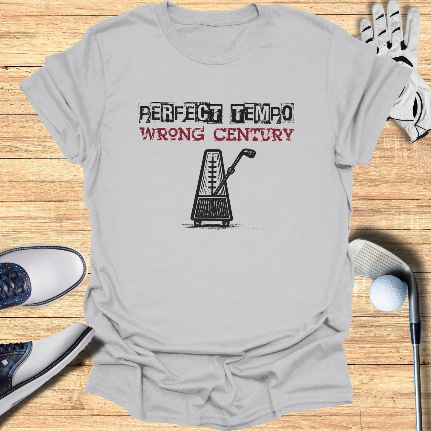 T-shirt with metronome graphic and text "PERFECT TEMPO WRONG CENTURY".