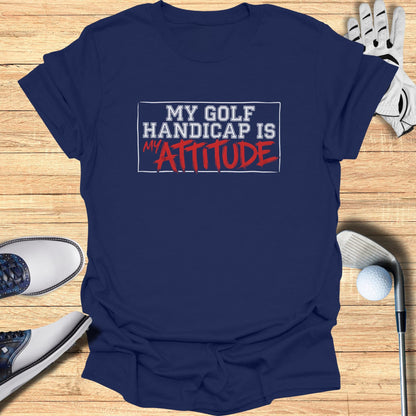 Navy t-shirt with "MY GOLF HANDICAP IS MY ATTITUDE" text.
