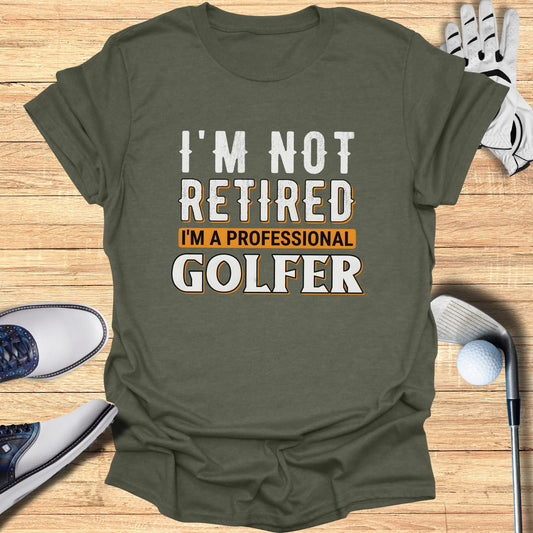 Green t-shirt with "I'm not retired, I'm a professional golfer" text.