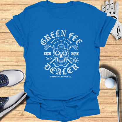 Blue t-shirt with "Green Fee Dealer" skull graphic, golf clubs, and scorecard.