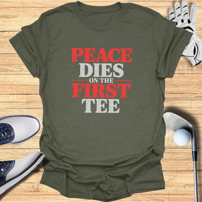 Olive t-shirt with "Peace Dies On The First Tee" in red and white text.