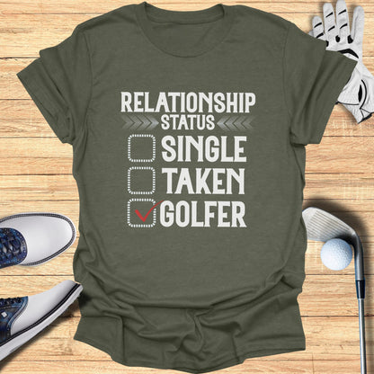Olive t-shirt with "RELATIONSHIP STATUS: SINGLE, TAKEN, GOLFER" and a checked box next to Golfer.